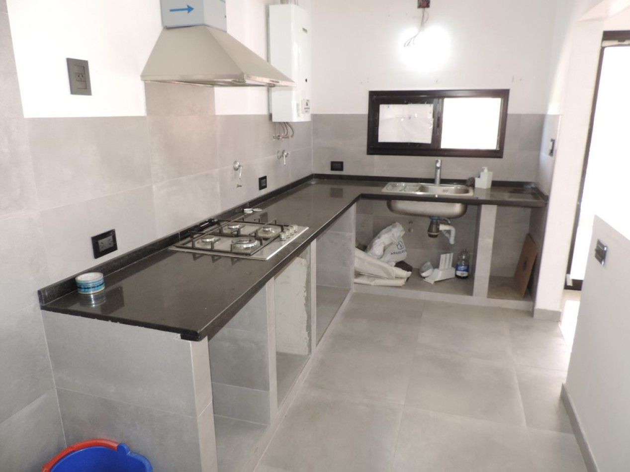 Venta casa 1 dorm. primera calidad en Roldan