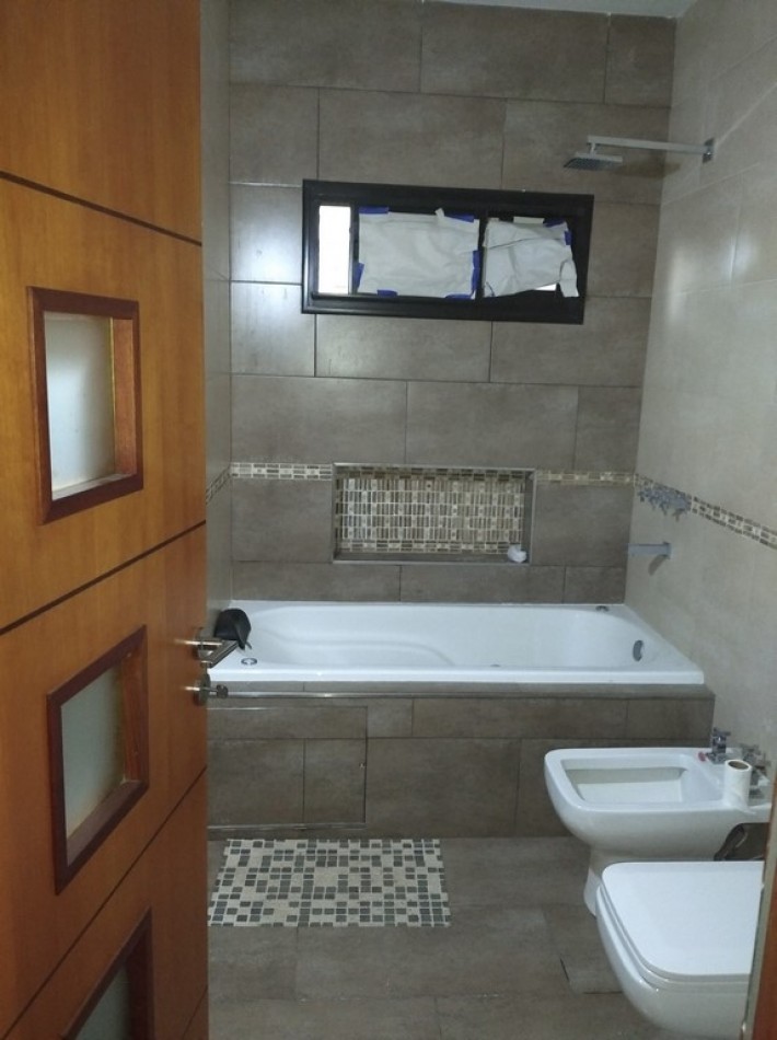 Venta casa 1 dorm. primera calidad en Roldan