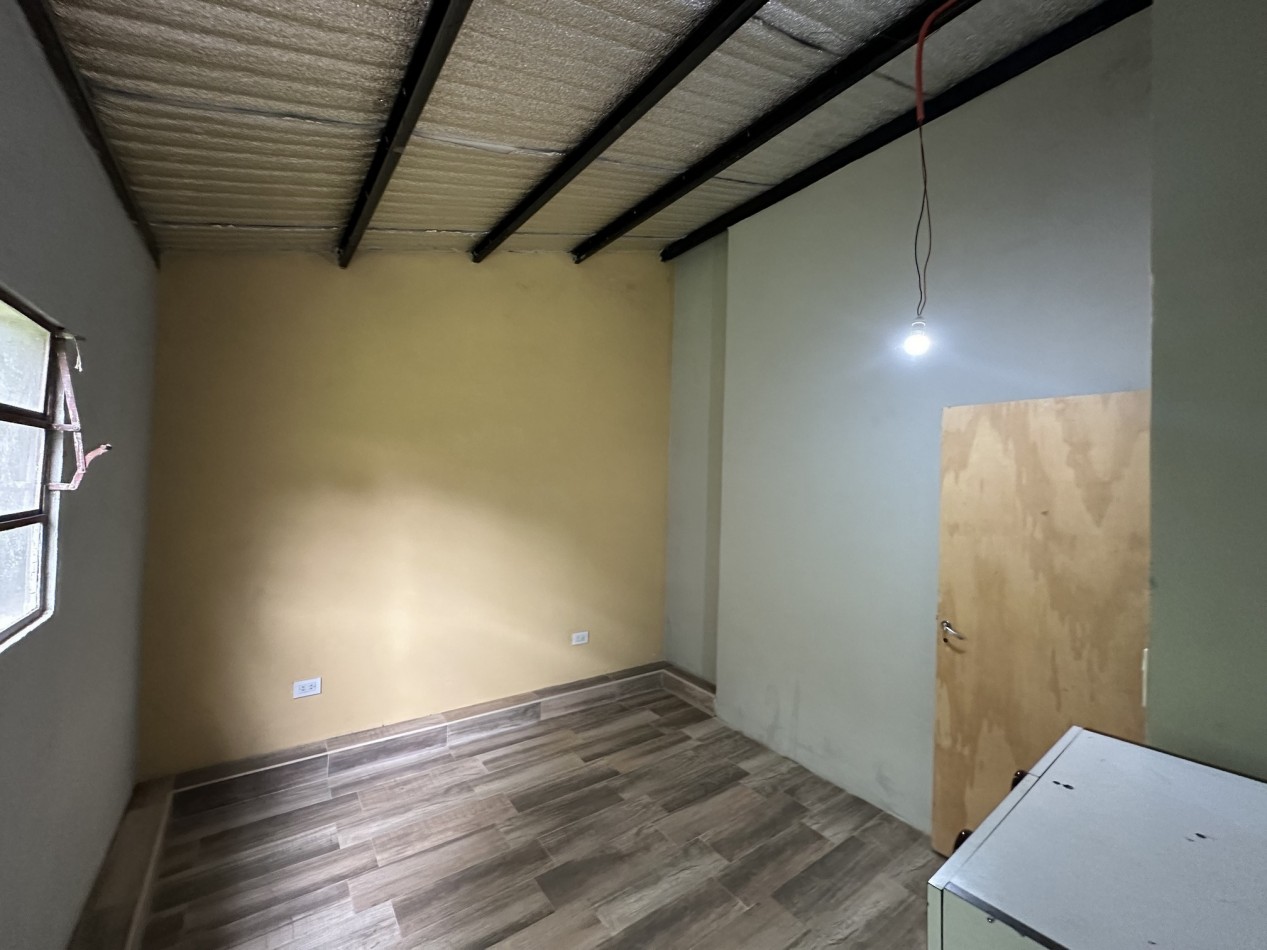 Venta Casa un dormitorio con parque forestado