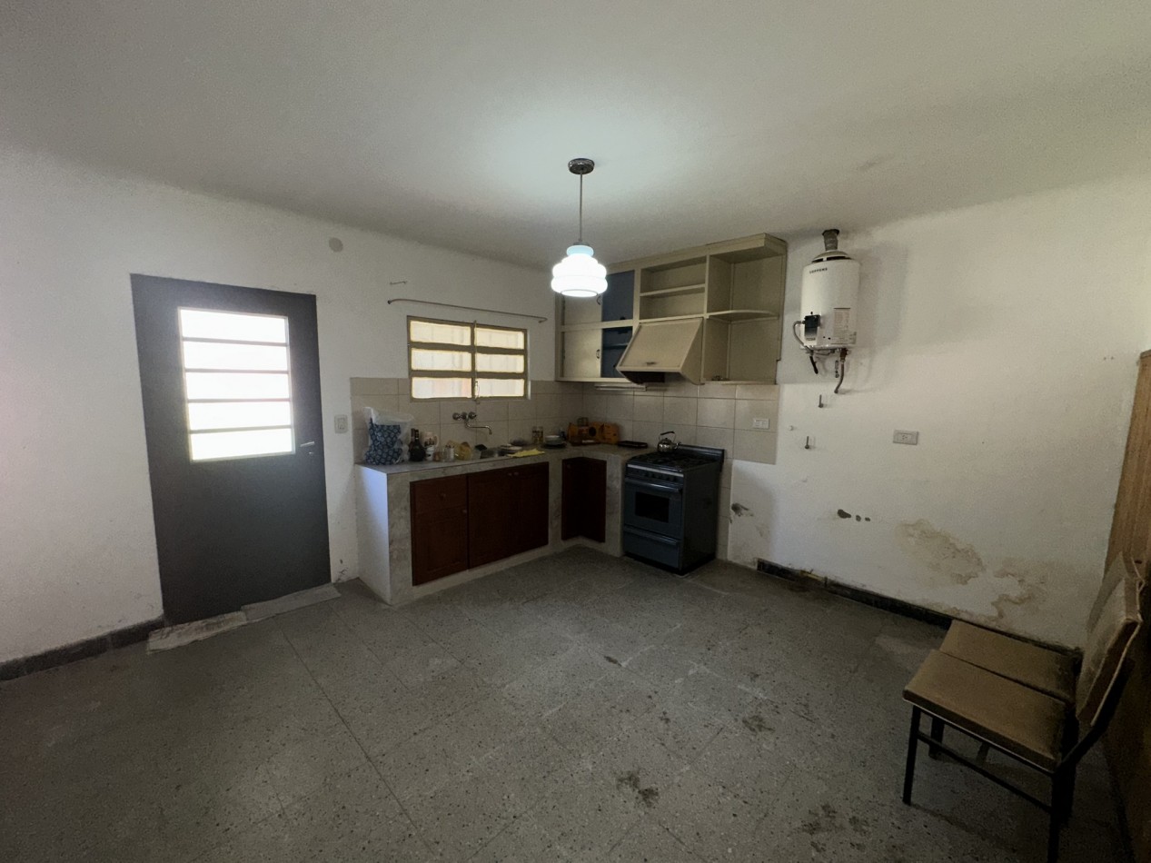 Terreno Urbano con casa reciclar - Ideal Uso Comercial 